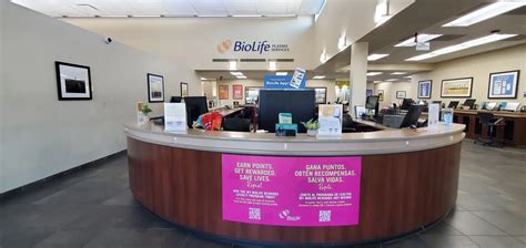Biolife Plasma Services Sign With Plasma Donation Center In Background Biolife Plasma Services Sign With Plasma Donation Center In Background